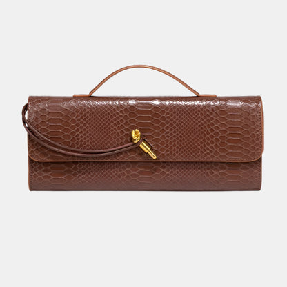 VANORA WOVEN CLUTCH