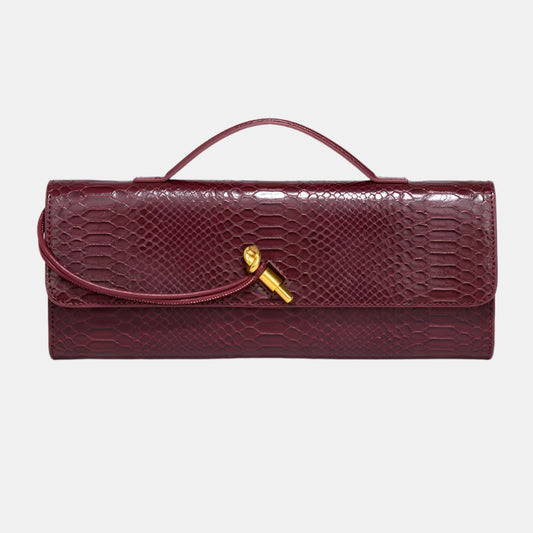 VANORA WOVEN CLUTCH